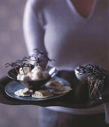 Insert toothpicks into plastic spiders for hors d'oeuvres! Insert toothpicks into plastic spiders for hors d'oeuvres!