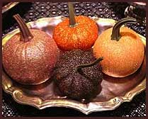 Pumpkins covered with glitter. Try black glitter for a gothic glam look. Pumpkins covered with glitter. Try black glitter for a gothic glam look.